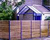 Horizontal timber slat and steel fence
