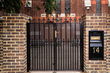 Steel gates with perforated sheet backing